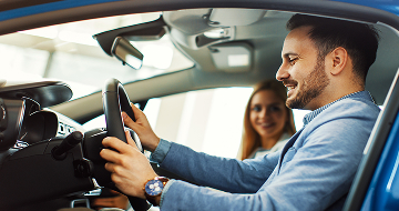 Couple driving in car RFCU News