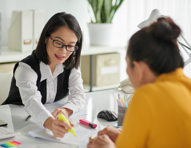 Two women talking Wire Transfers